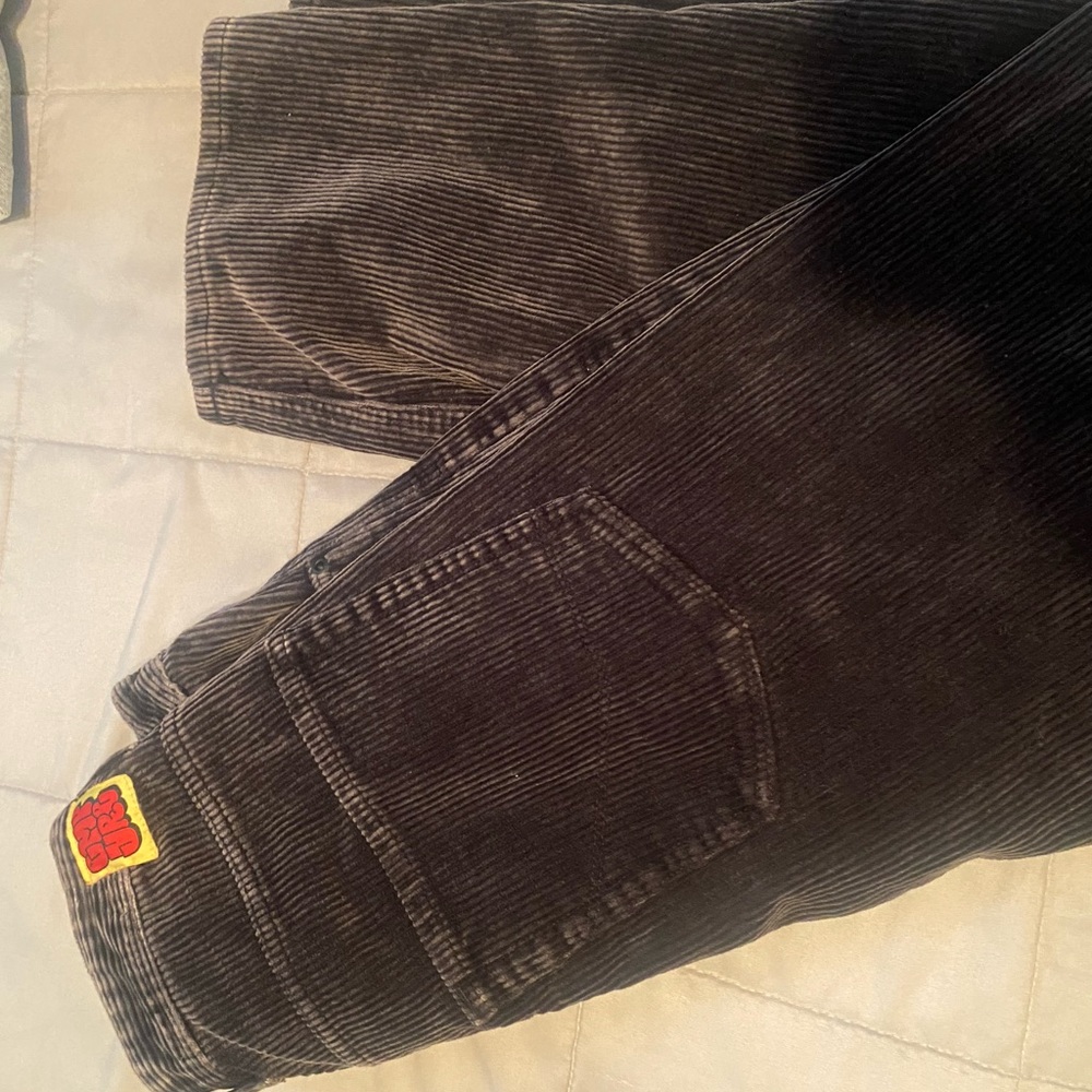 Distressed black empyre baggy corduroy skater jeans